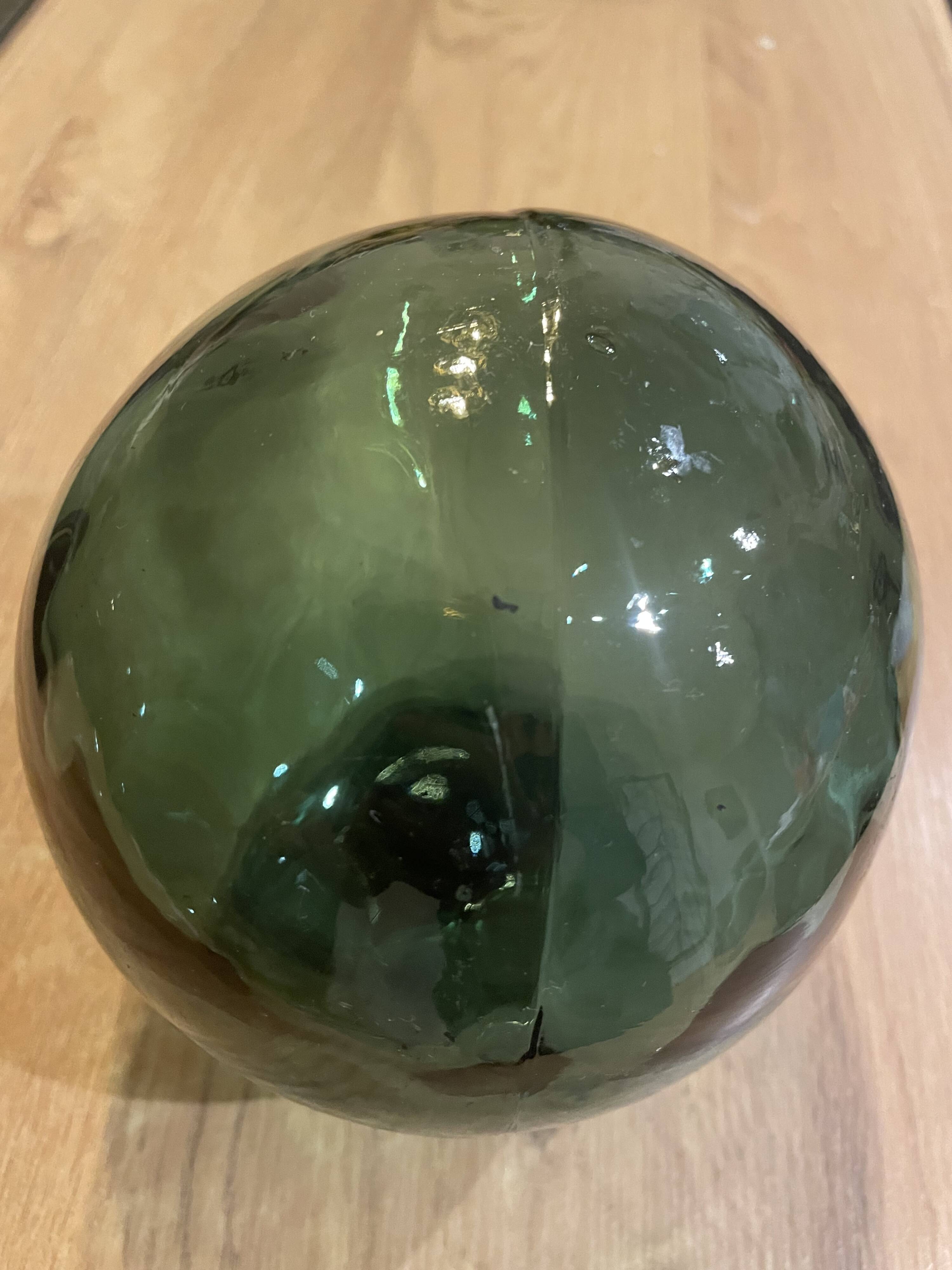 Floating fishing ball in glass