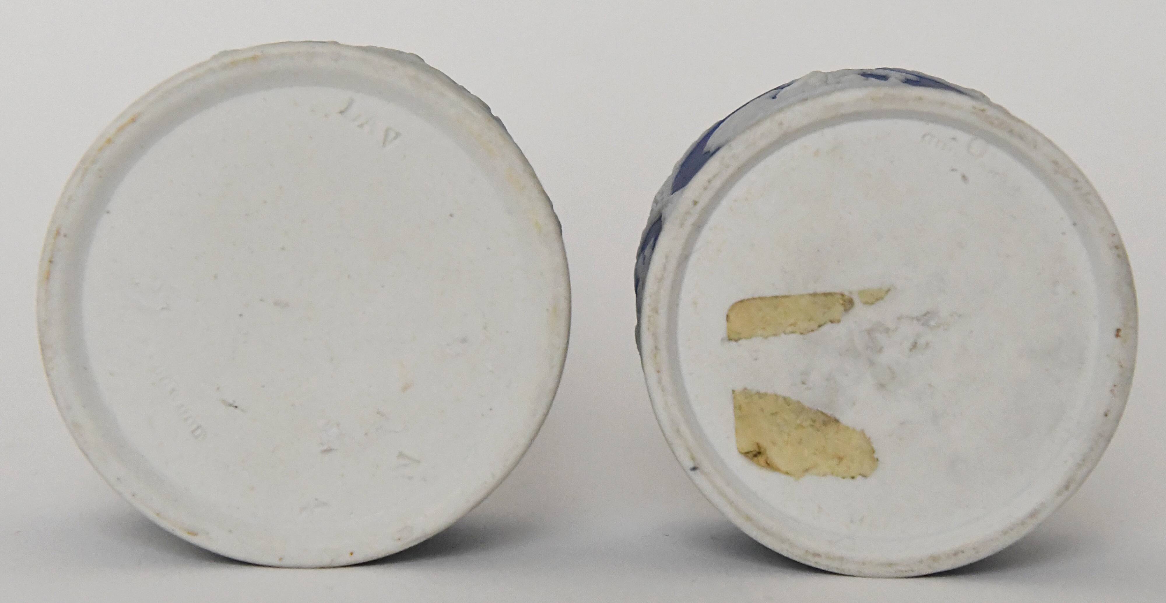 Pair of Wedgwood biscuit boxes with relief decoration of antique scenes