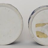 Pair of Wedgwood biscuit boxes with relief decoration of antique scenes