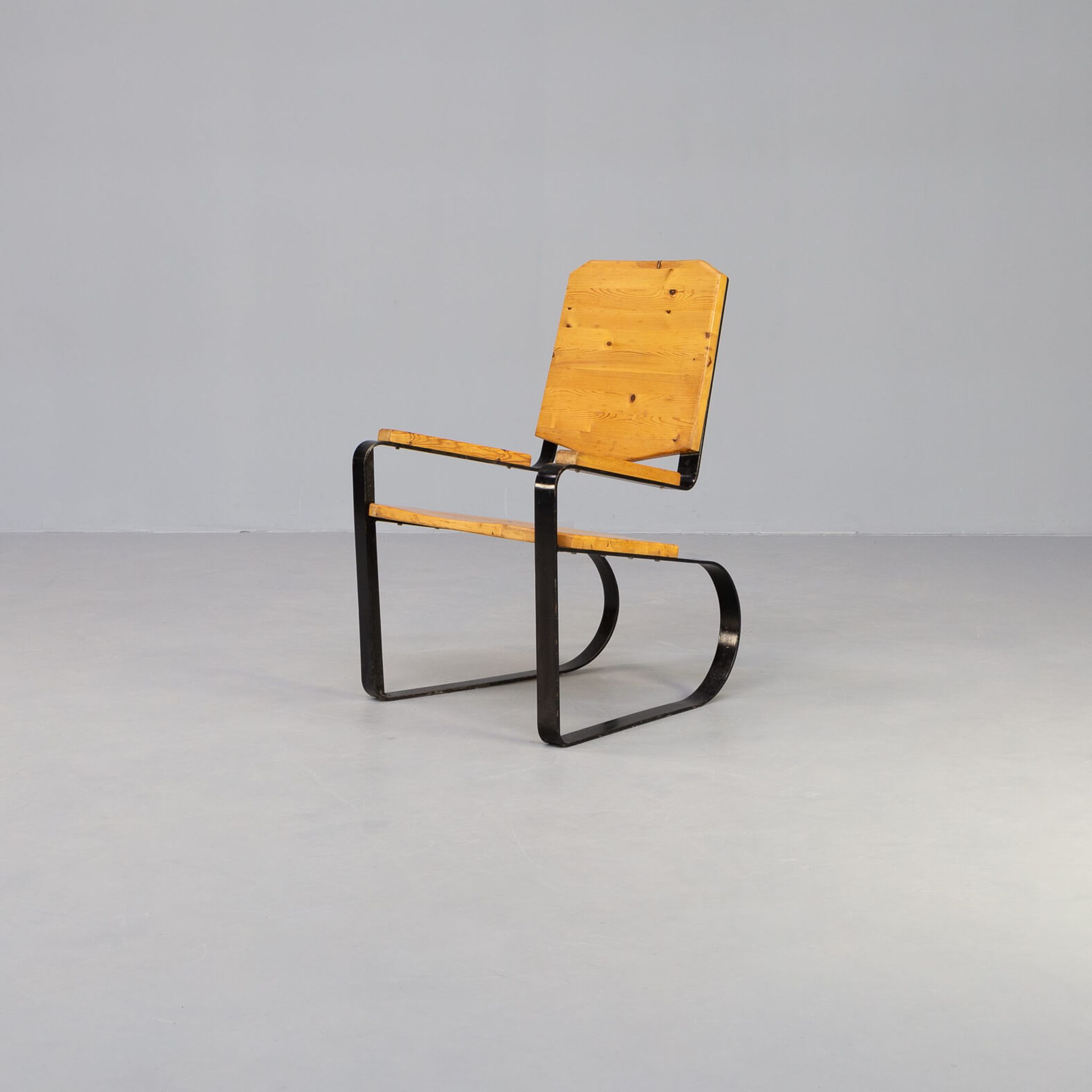 60s Unique metal cantilever framed lounge chair with pine seat