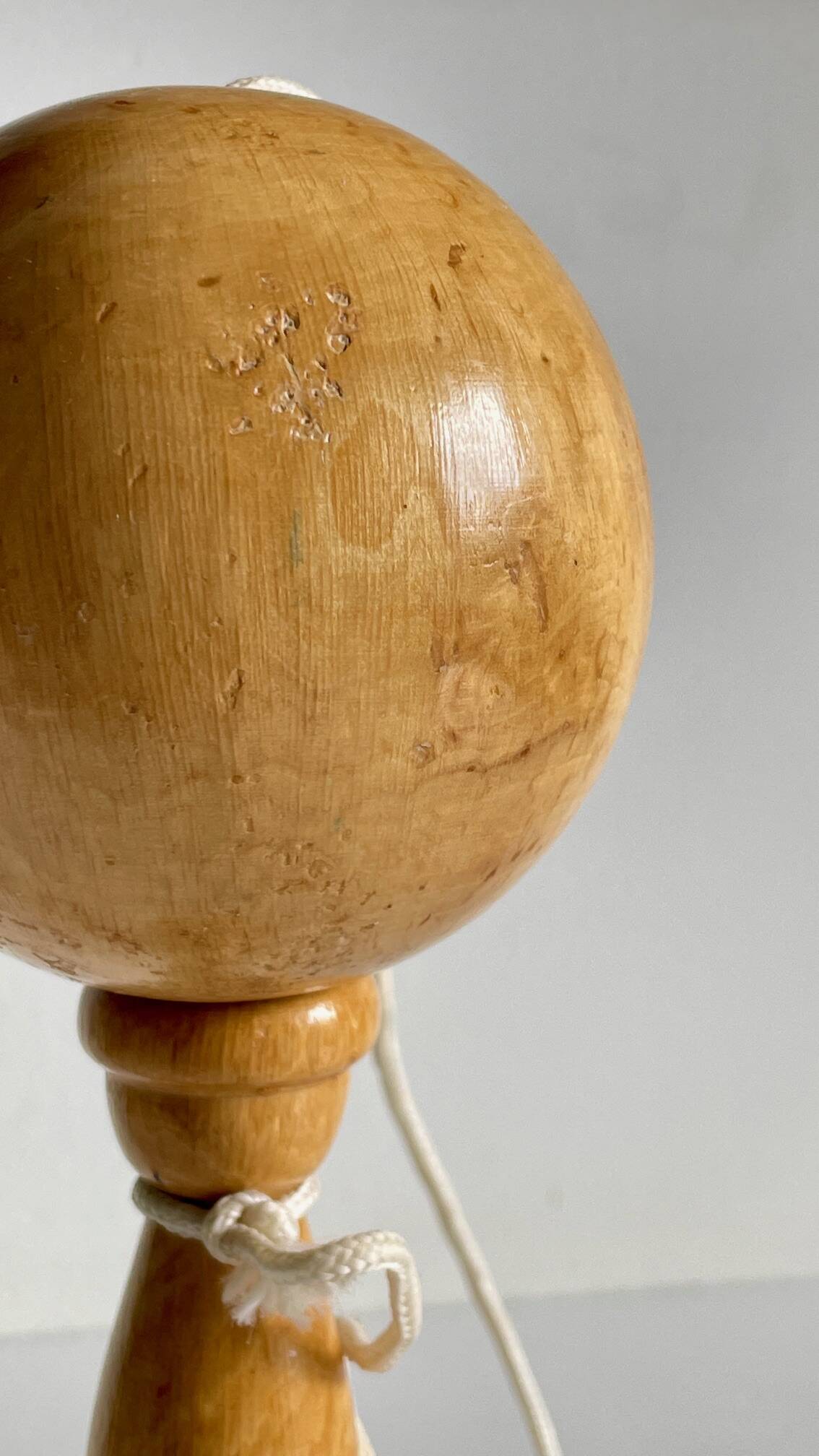 Vintage wooden cup-and-ball toy