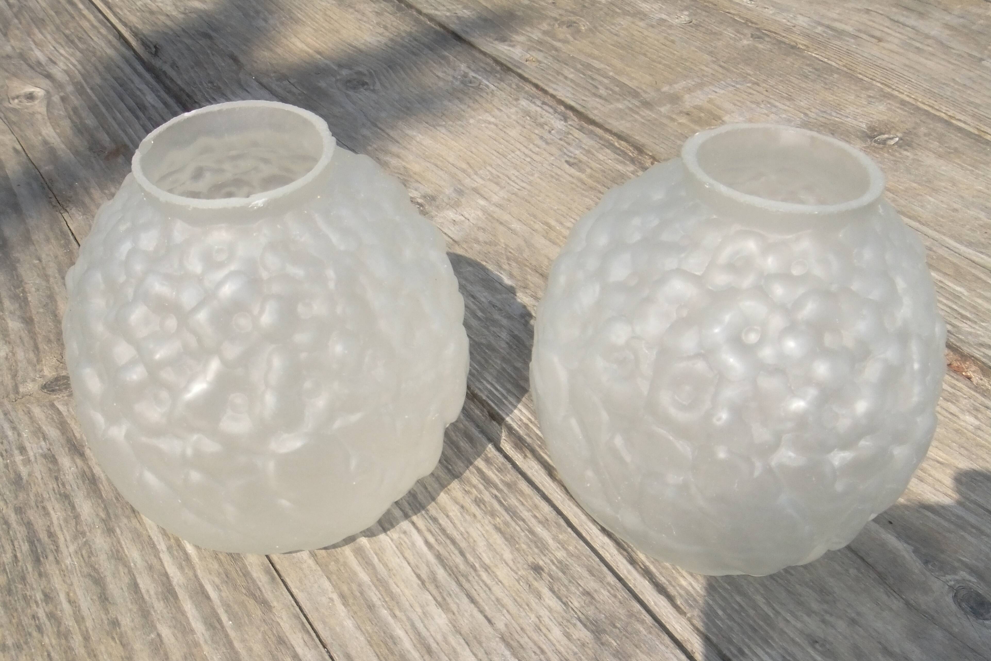 Art Deco ball vase pair with flower and leaf decor