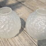 Art Deco ball vase pair with flower and leaf decor