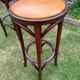 Pair of curved wooden bistro stools with leather seats