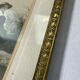 Old photo frame in golden brass floral decoration and small knot 18th With glass