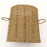 Braided straw wastepaper basket.