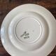 Two identical vintage Clarice Cliff plates from the Newport Pottery.