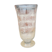 Ancient transparent glass vase with engraved plant decoration.