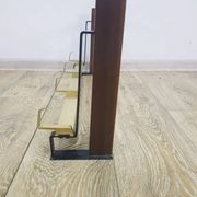 Wall-mounted coat rack, rosewood, gold-tone brass, Austria, 1960s.