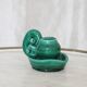 Vintage green slip ceramic candle holder