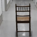 Pair of wooden caned chairs