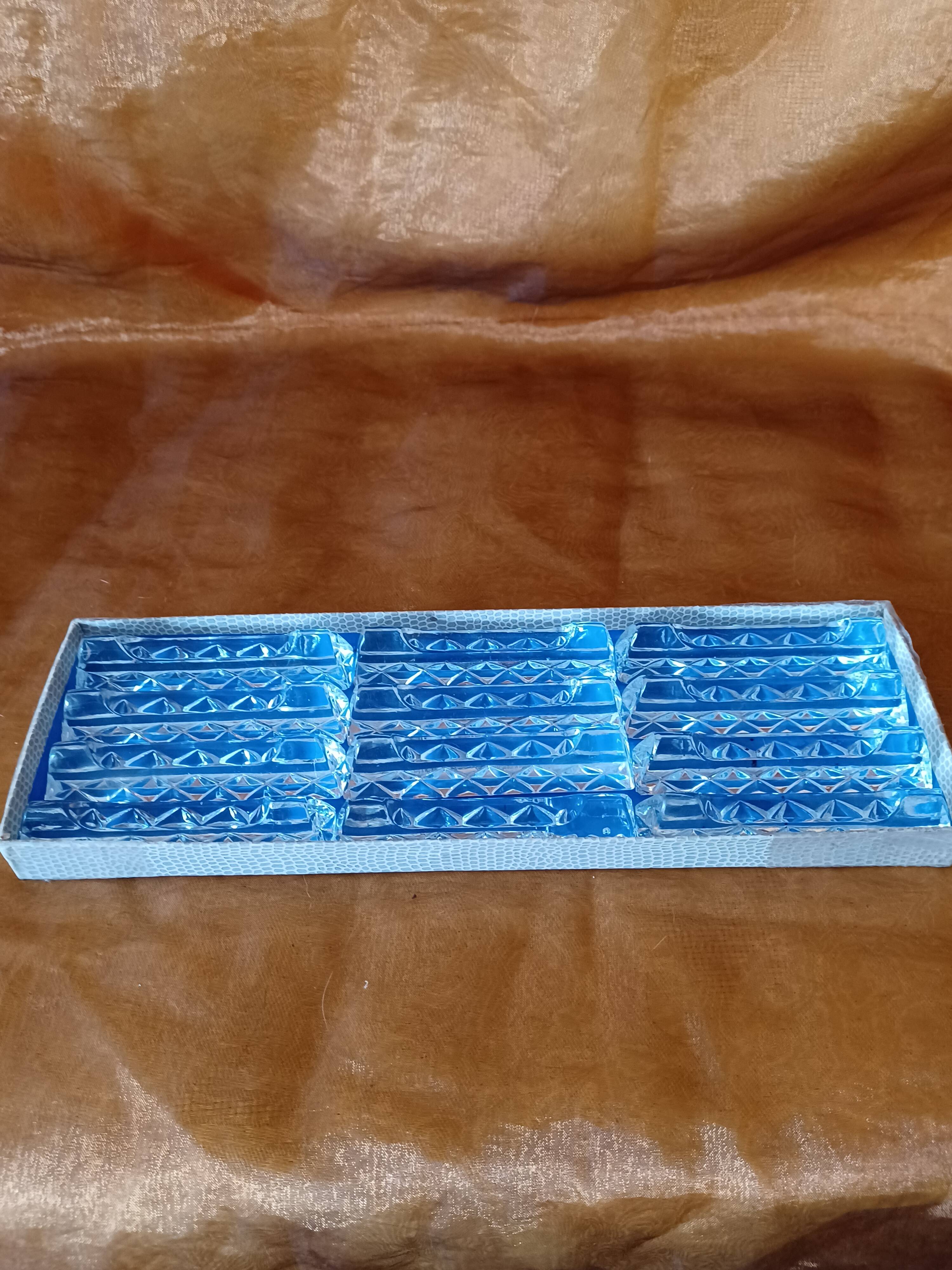 12 cut crystal knife holders.