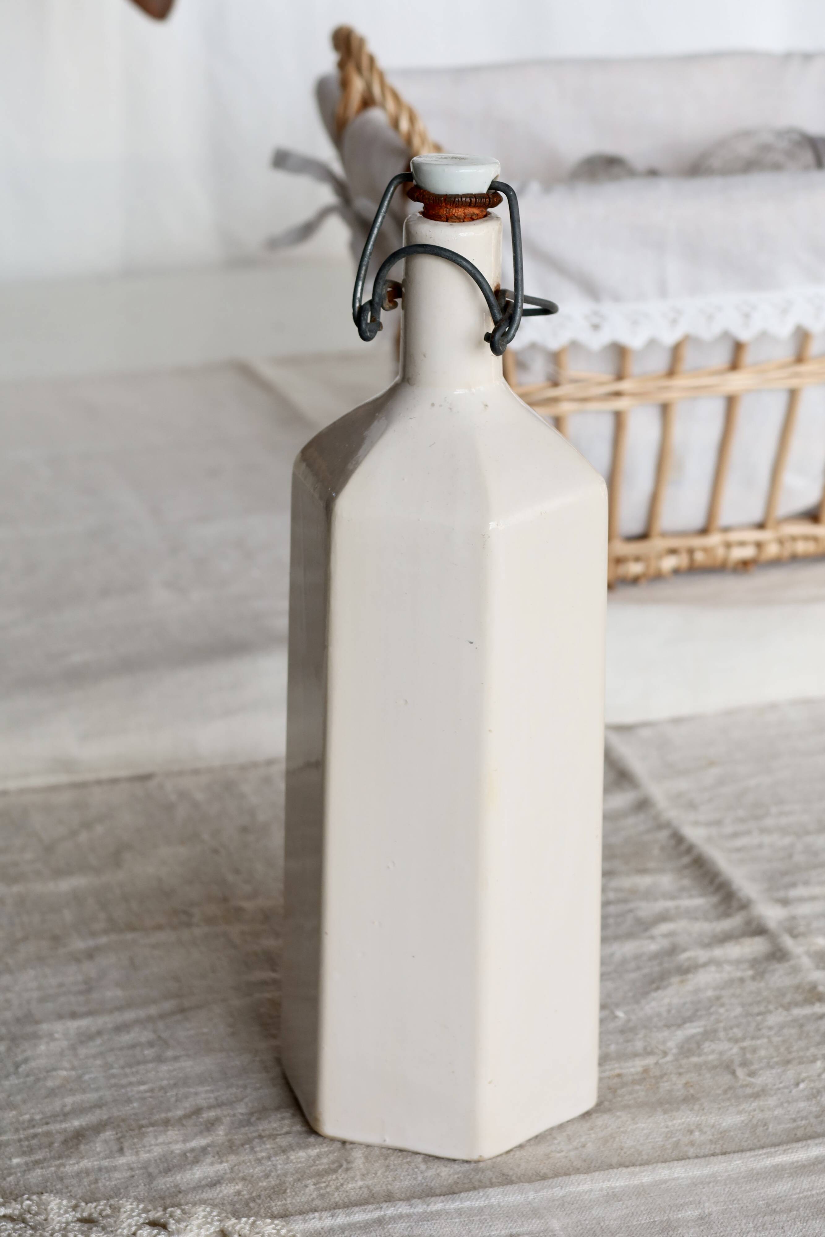 Antique beige glazed ceramic bottle