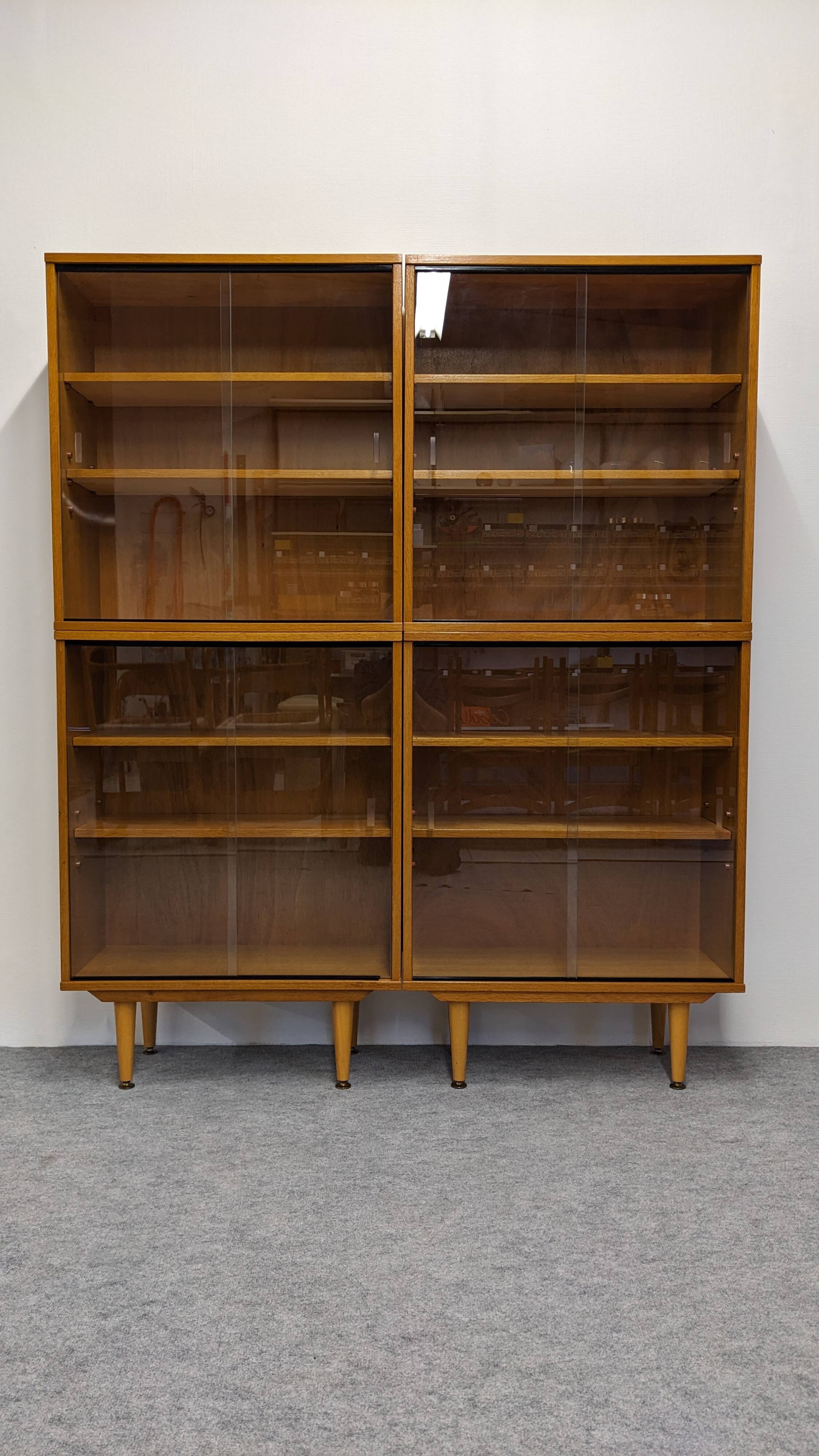 Library or display cabinet with 4 modules in light oak, France around 1960.