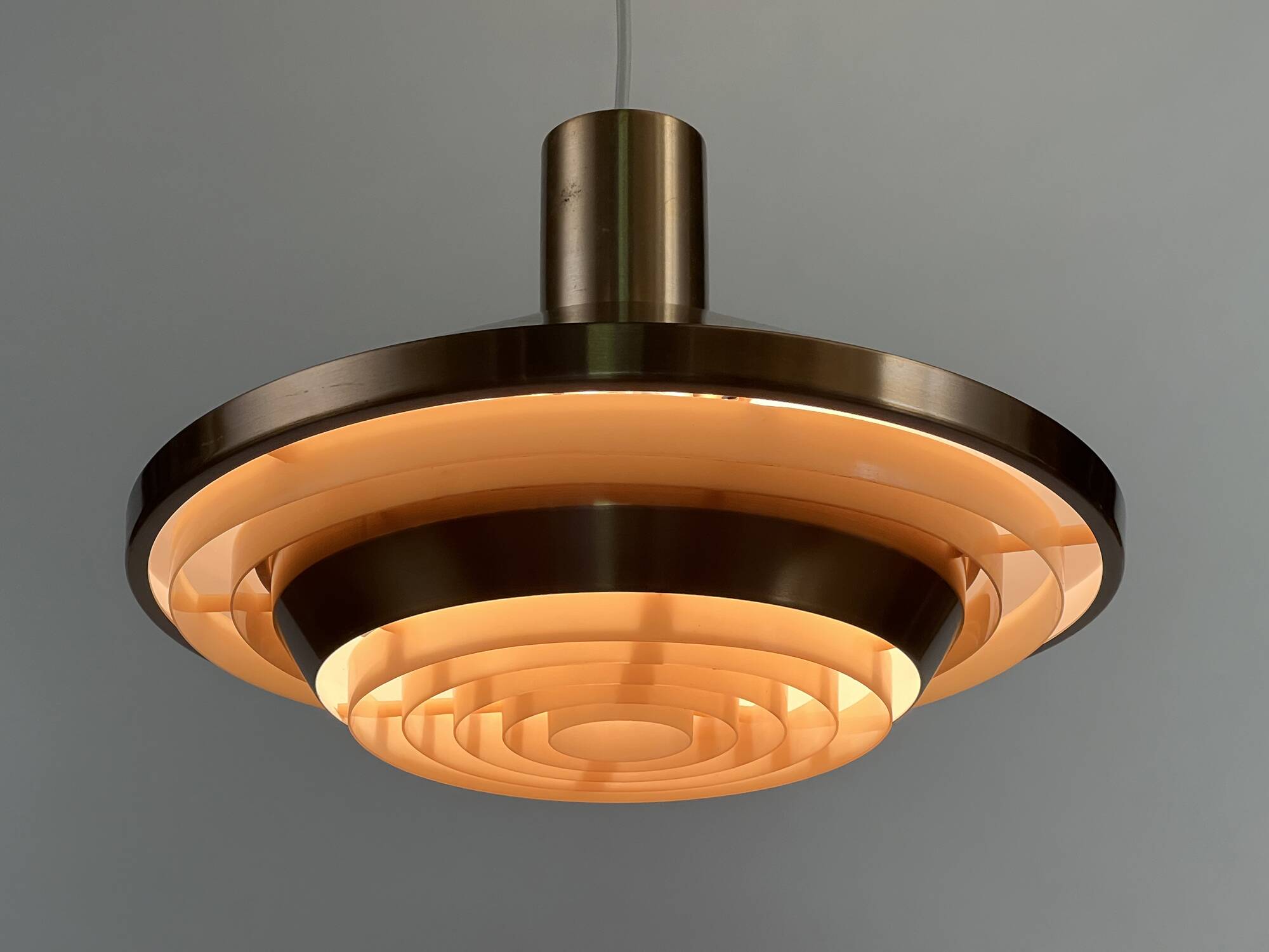 Copper colored aluminum pendant light from Lyskaer belysning. Denmark 1970s