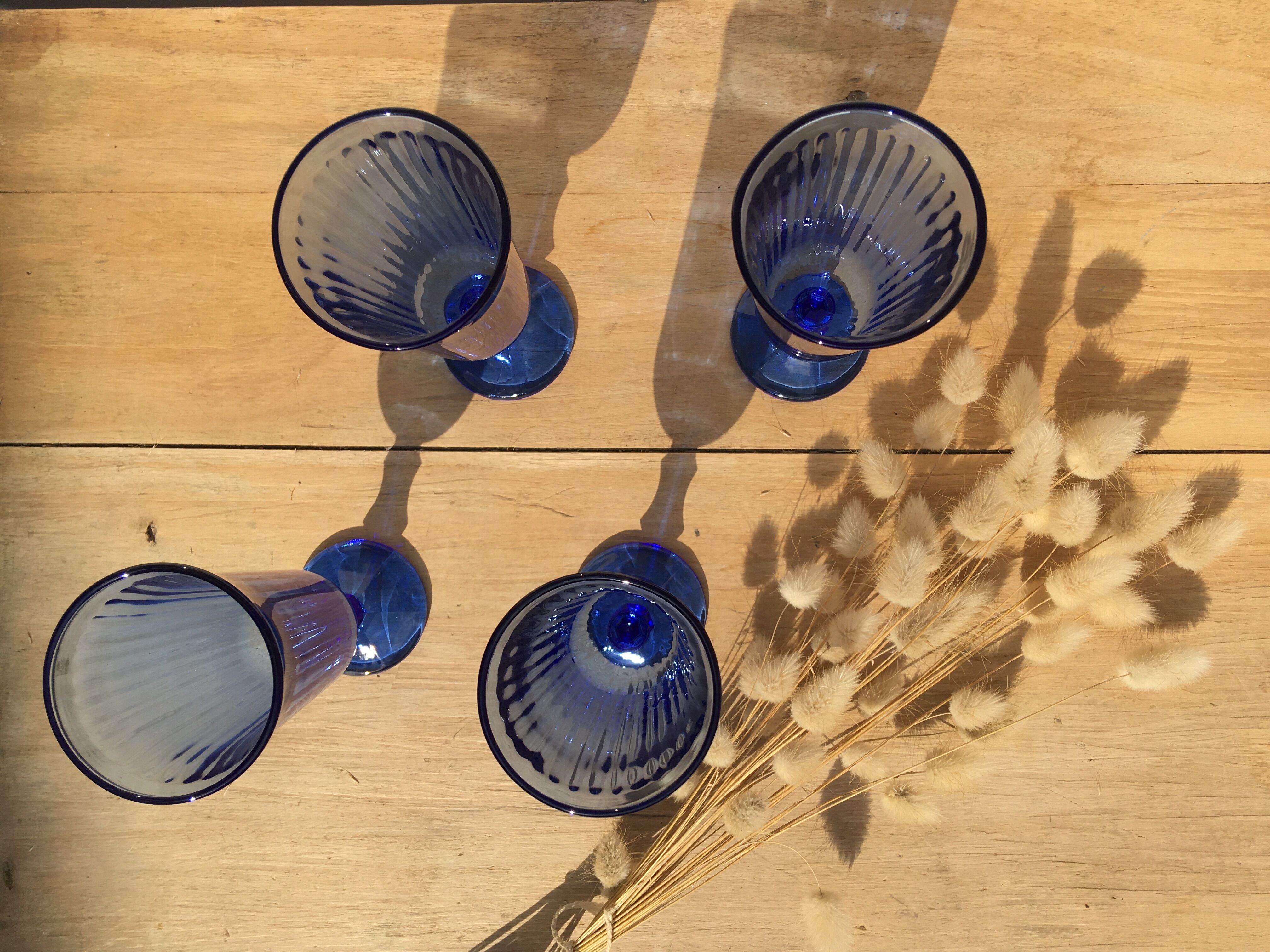 Champagne flutes in blue glass