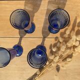 Champagne flutes in blue glass