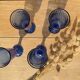 Champagne flutes in blue glass