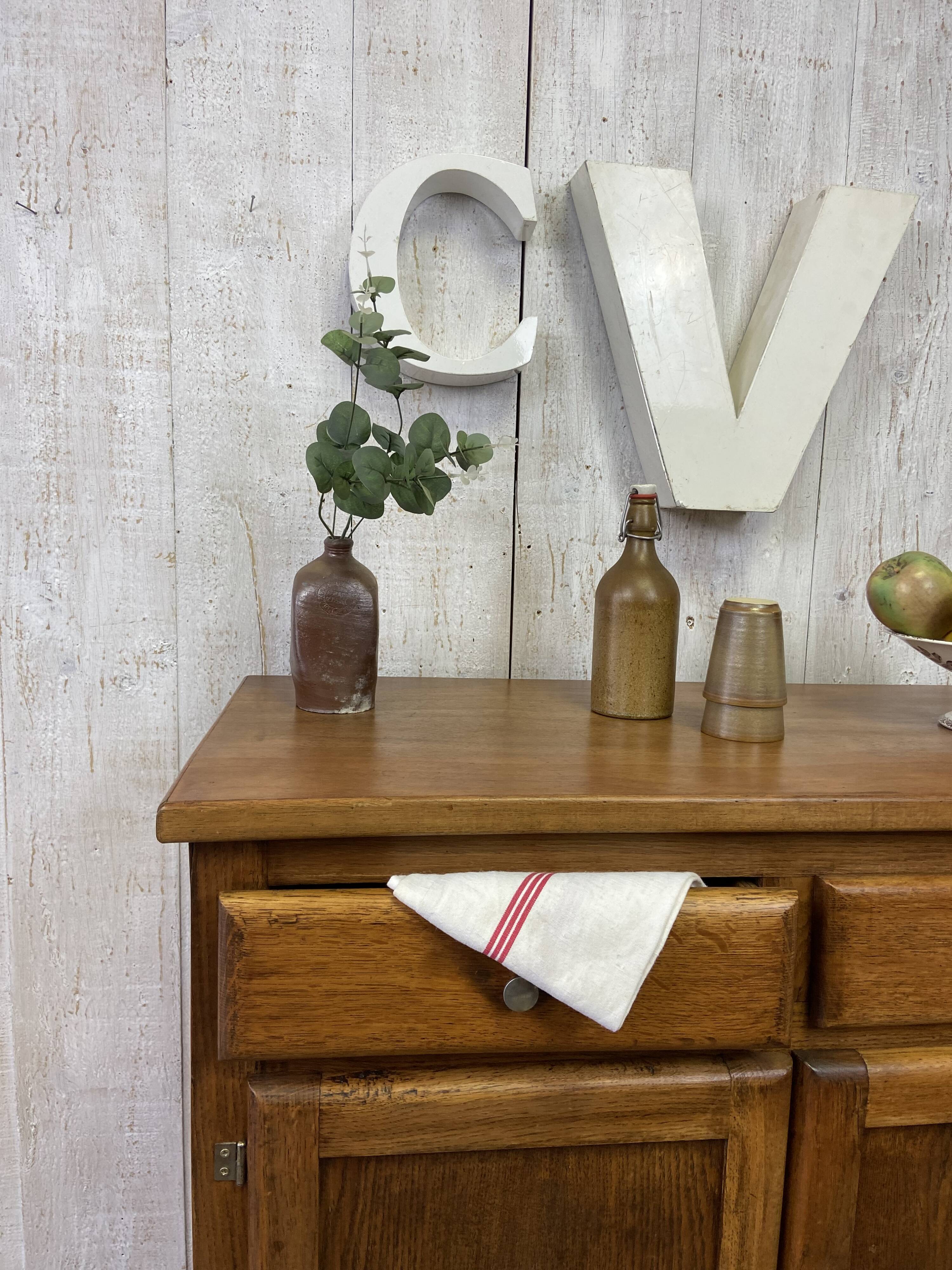 Vintage sideboard with "moustache" base