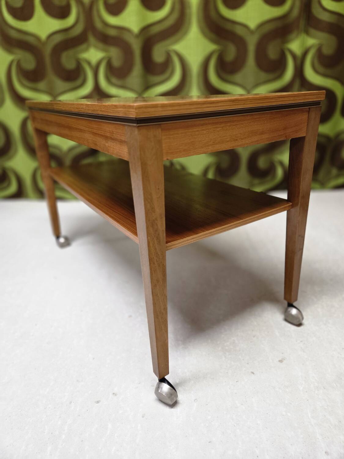Teak serving table with casters, 1970s