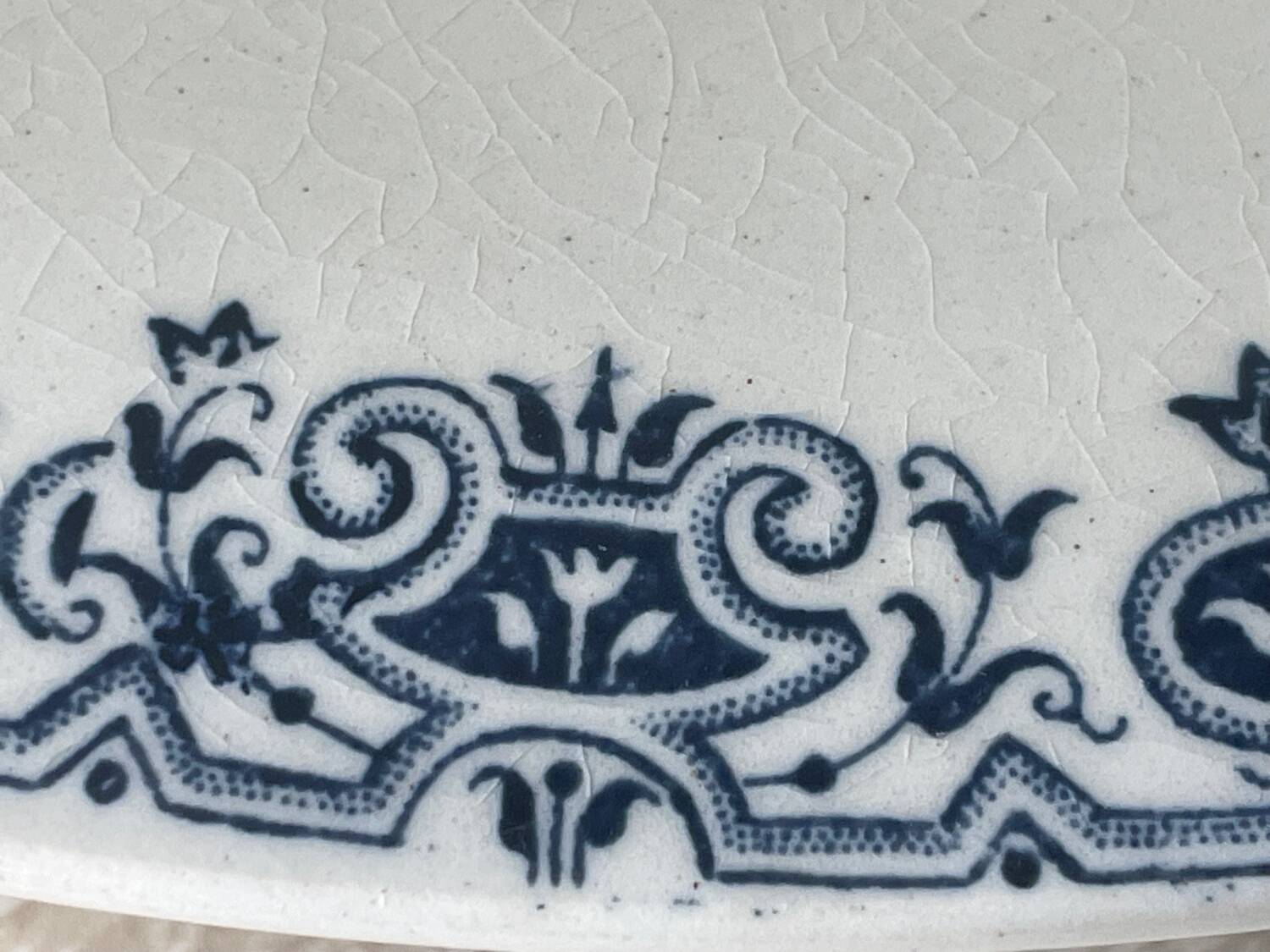 Old opaque porcelain dish from Gien, Montmorency model