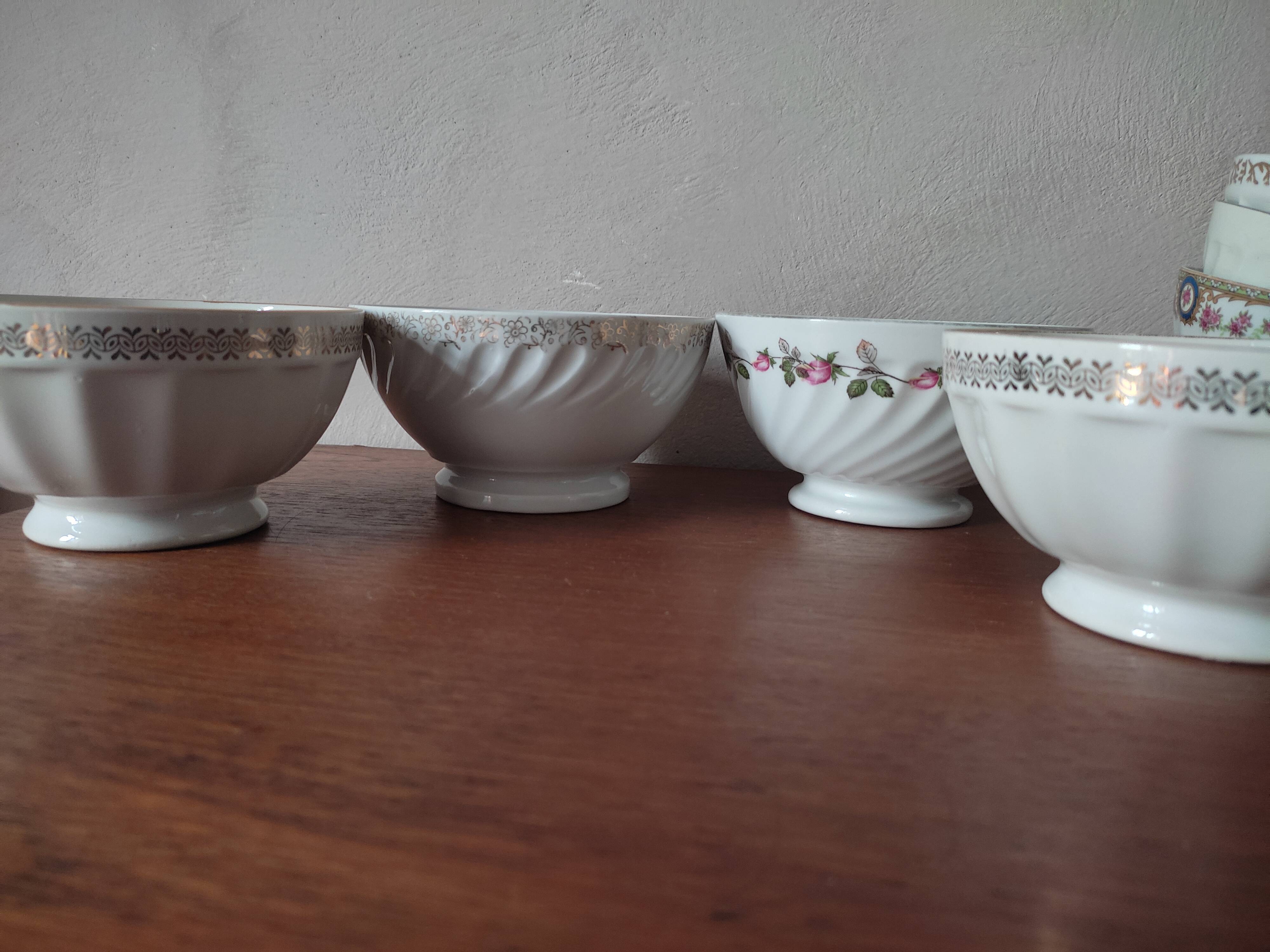 Set of 12 mismatched porcelain bowls