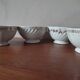Set of 12 mismatched porcelain bowls