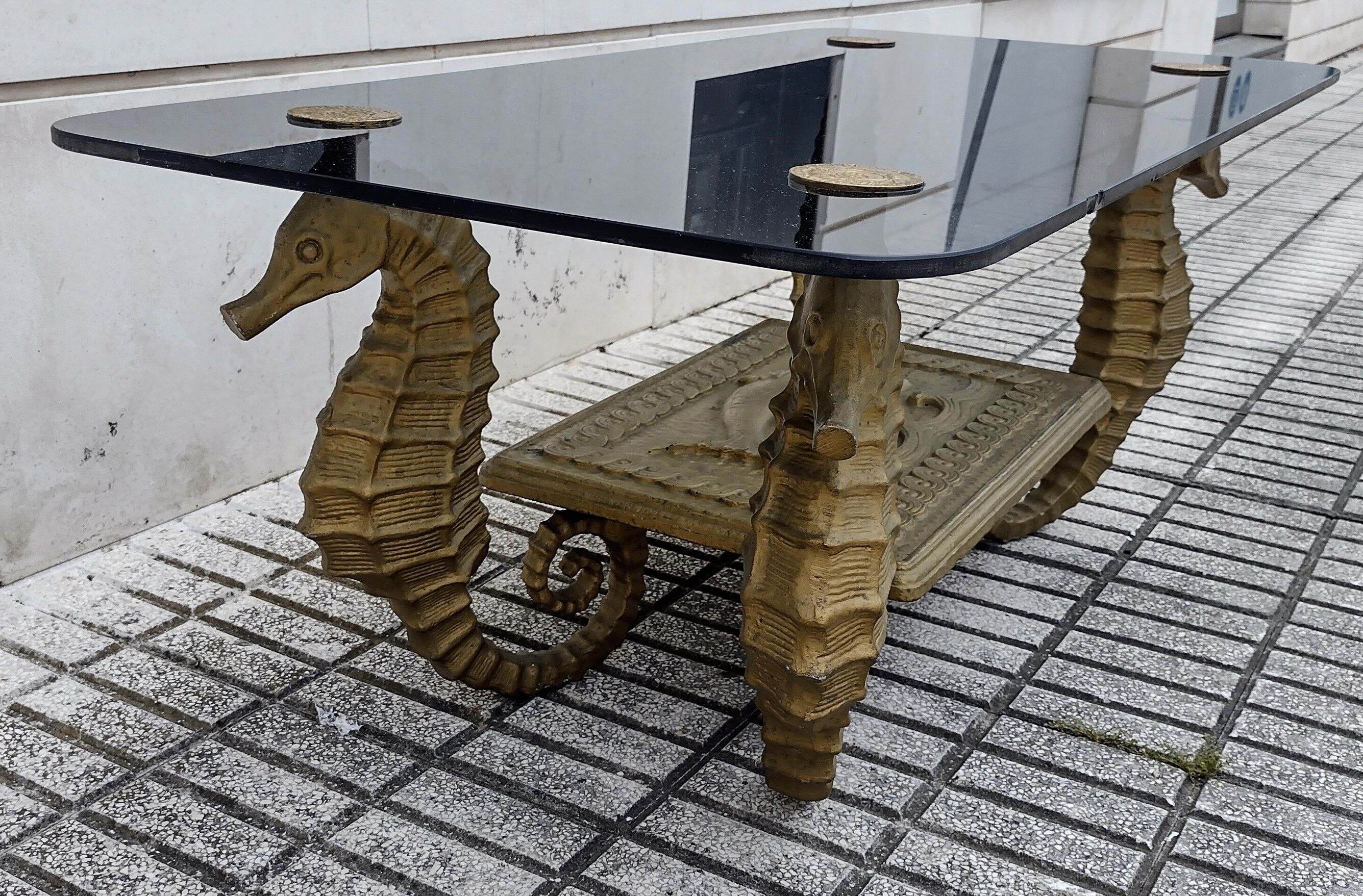 Gilt metal Seahorse coffee table with smoked glass