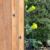 Parisian hotel wardrobe with bevelled mirror, solid raw oak, 1920.