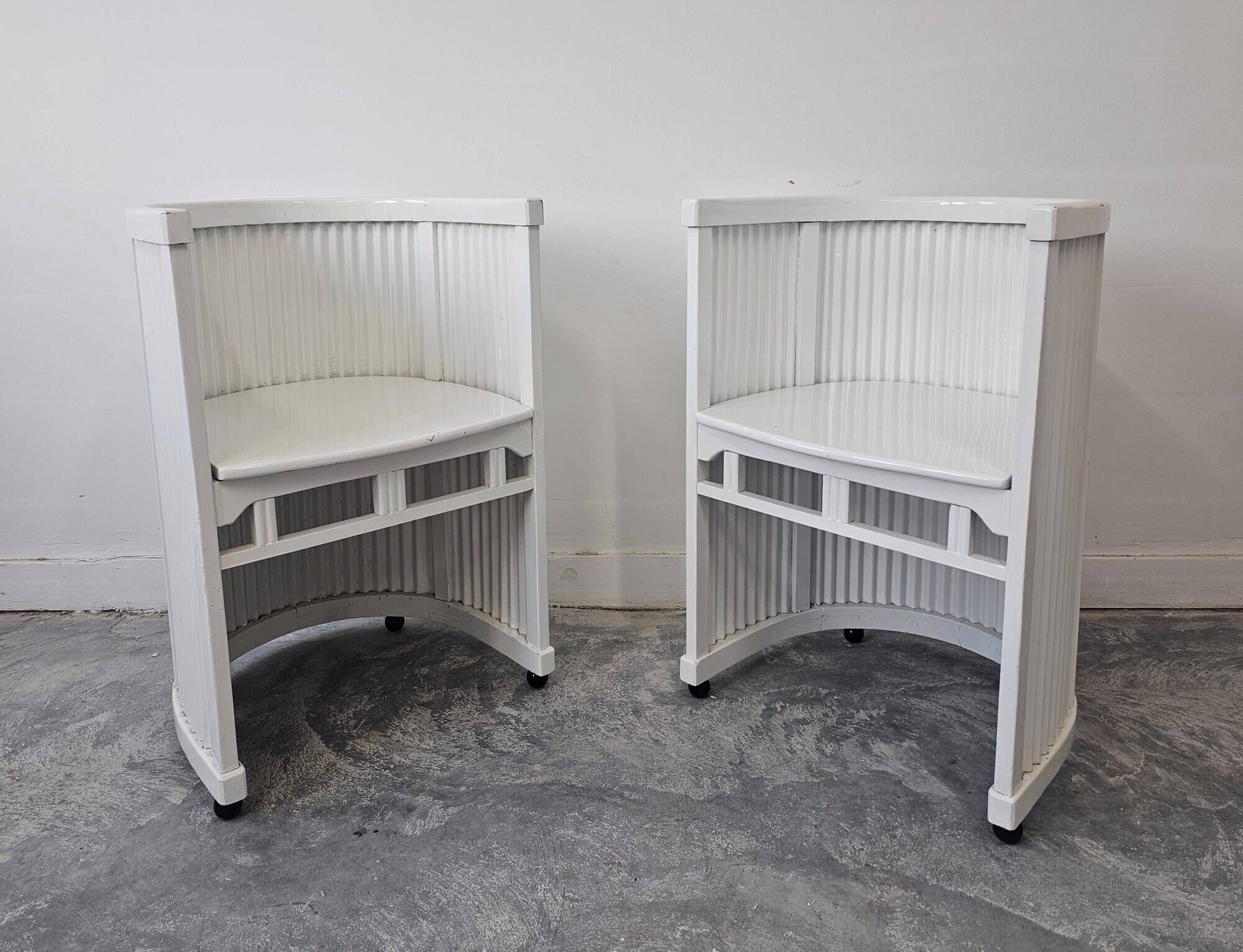 Pair of antique horseshoe accent chairs attributed to Hans Gunther Reinstein.