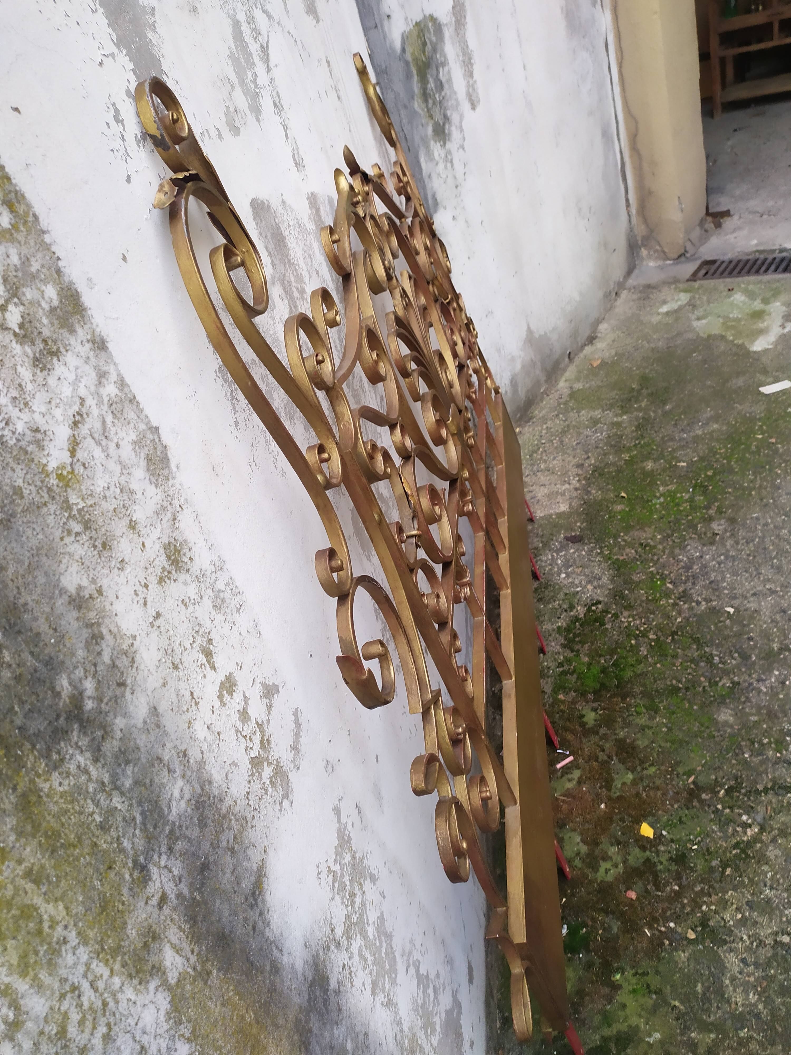 Golden wrought iron bedhead