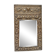 Bevelled mirror from the 1930s in repoussé brass.