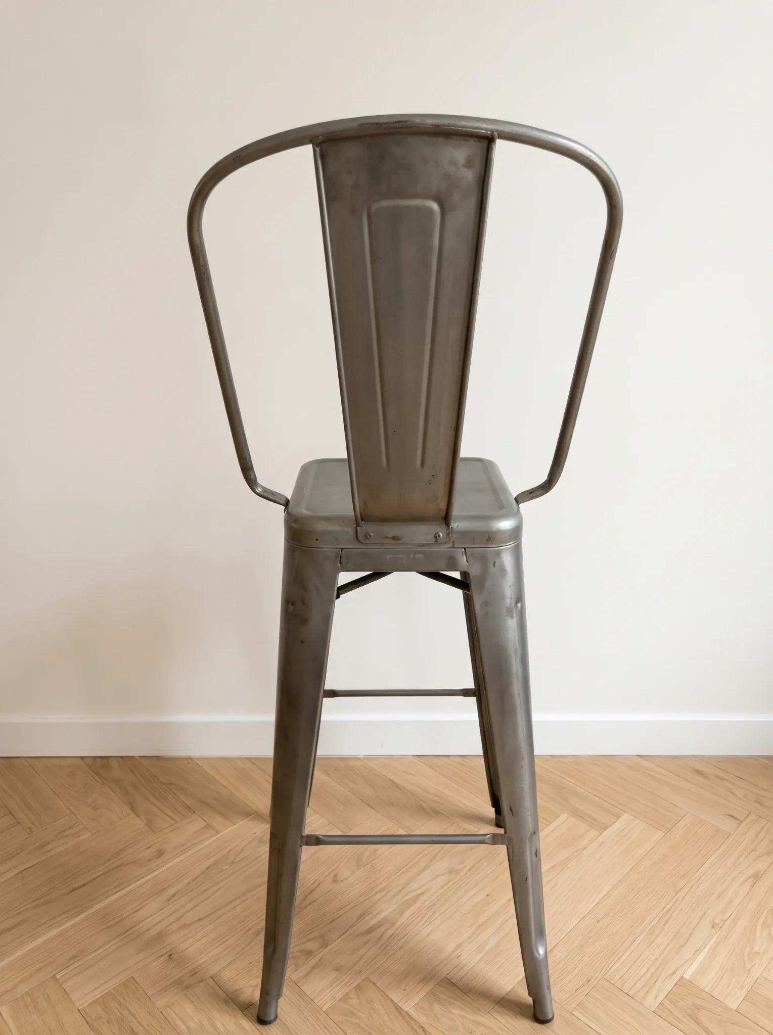 4 industrial grey metal Tolix bar stools