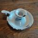 White patinated enamelled metal candle holder