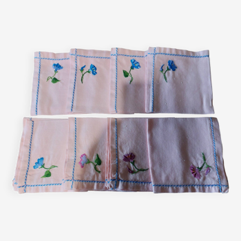 Set of eight embroidered pink cotton napkins 24.5 x 25 cm