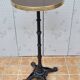 Vintage cast iron and brass "standing" bistro table, 109 cm