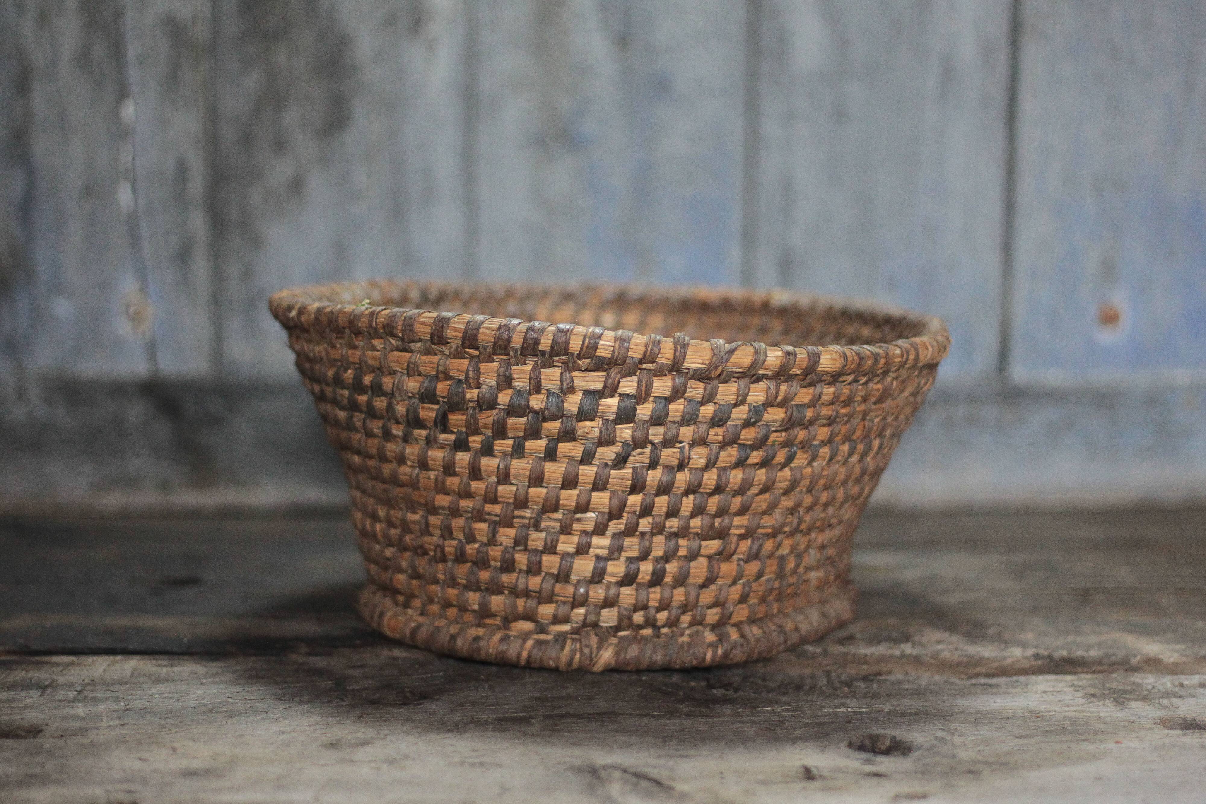 Old wicker basket, straw and bramble, woven basket, countryside, chal.