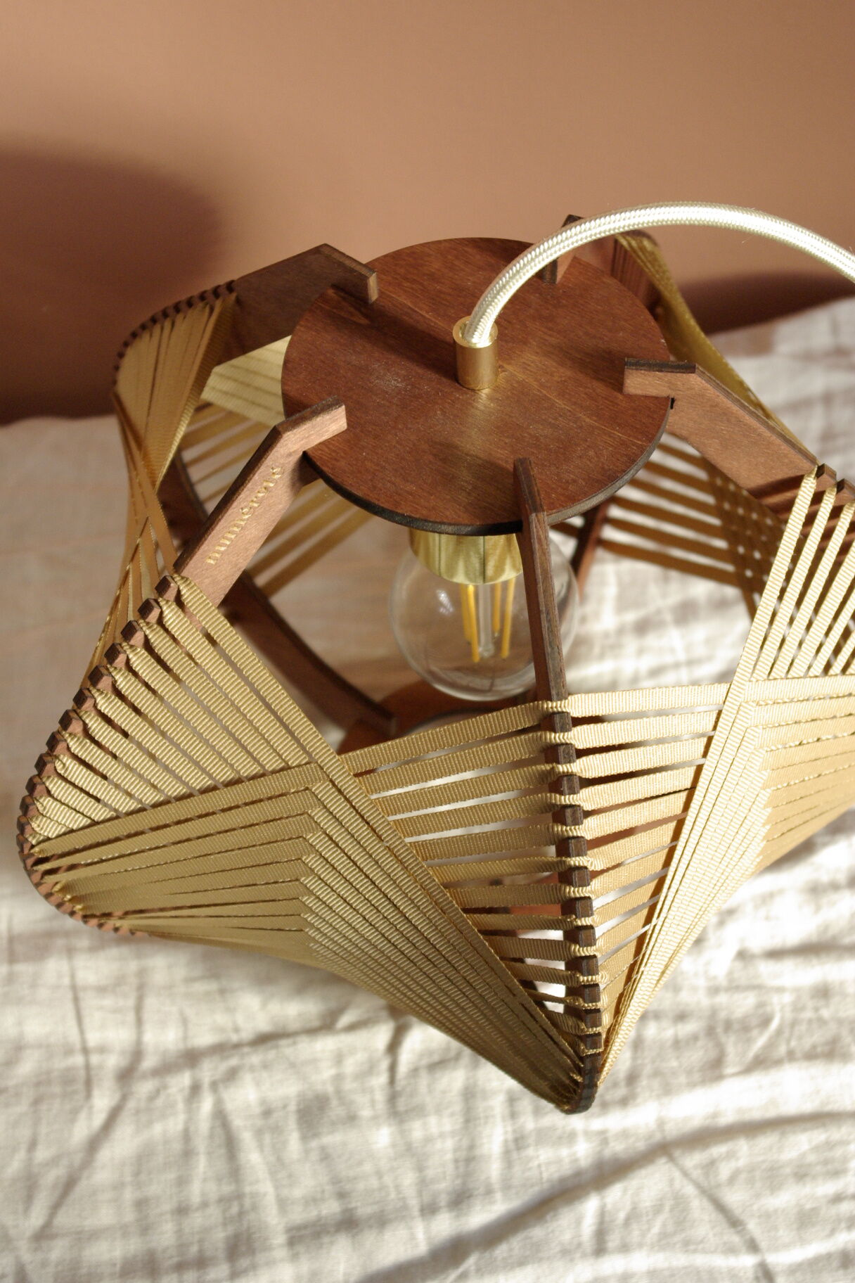 Woven camel lamp to install