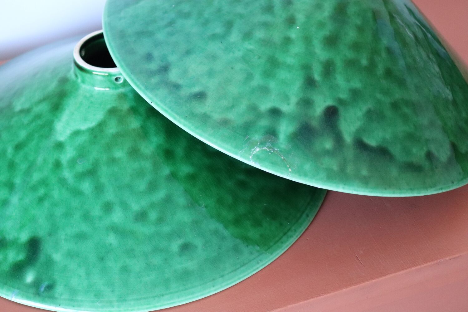 Two vintage green ceramic lampshades