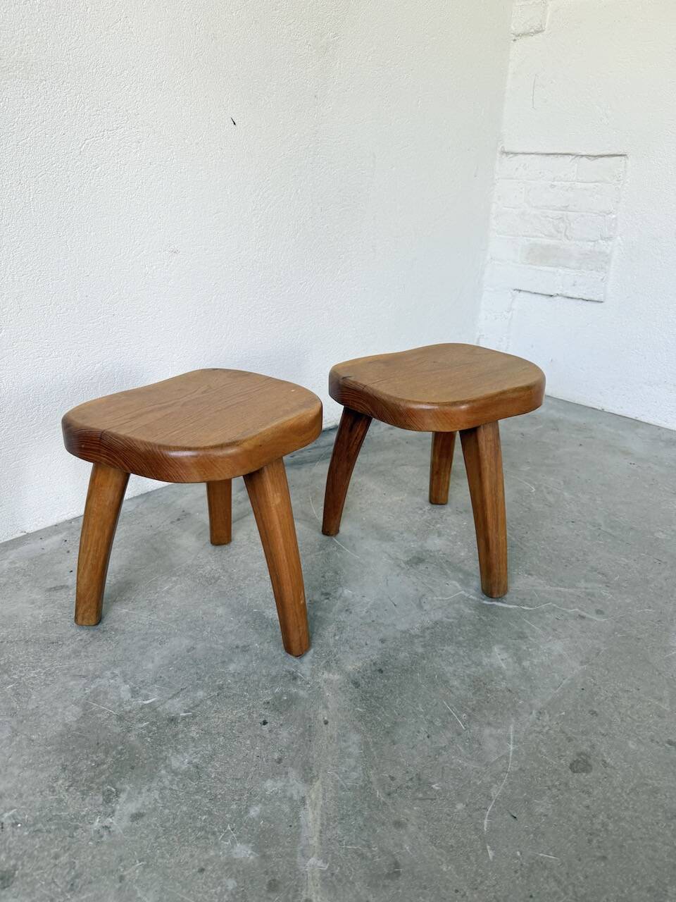 Pair of Henri Bataille oak stools