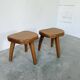 Pair of Henri Bataille oak stools