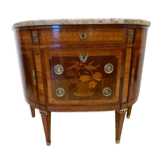 Louis XVI style half-moon chest of drawers in late nineteenth century marquetry