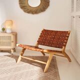 Wooden armchair with leather straps