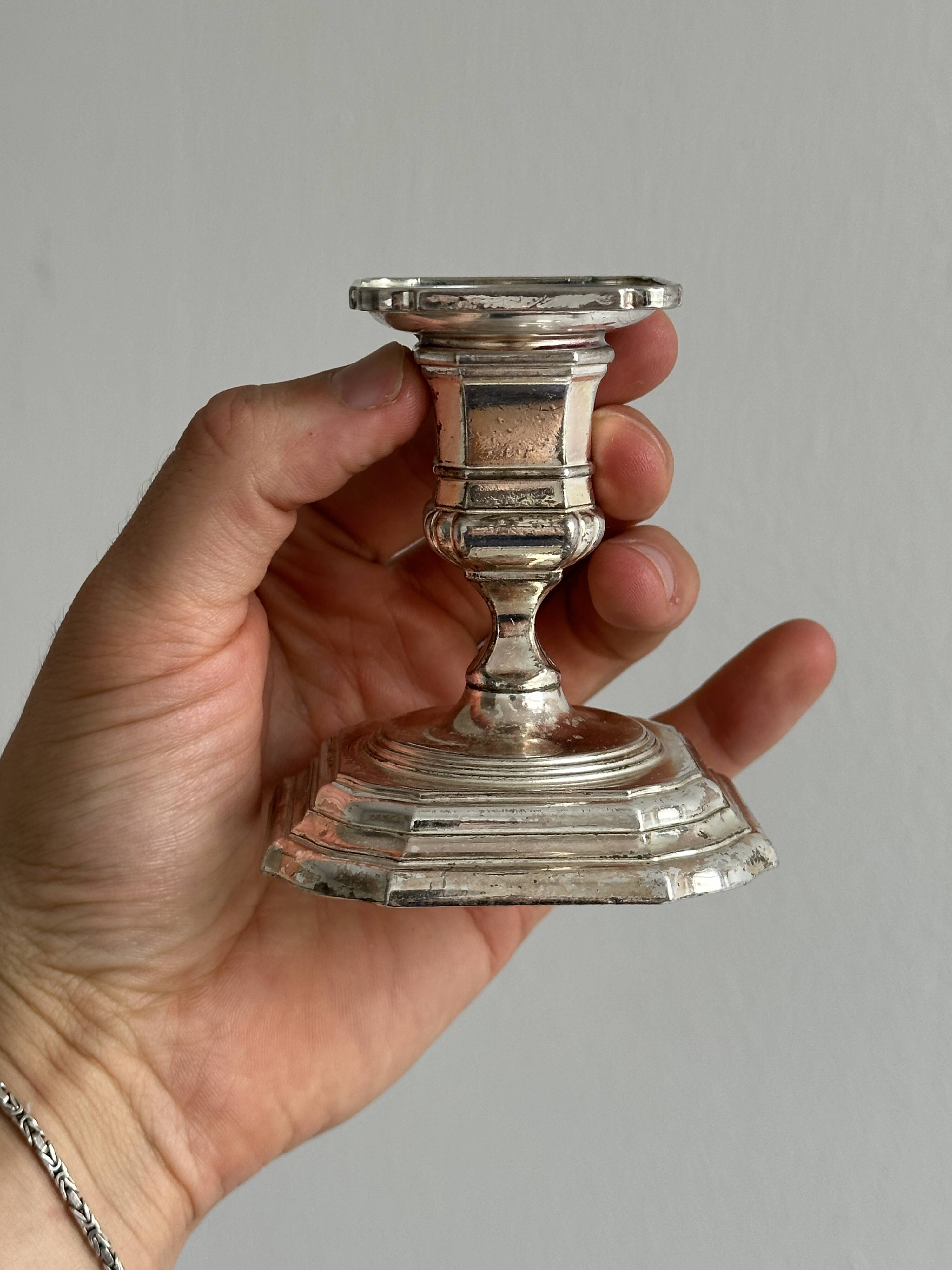 Small antique metal candle holder