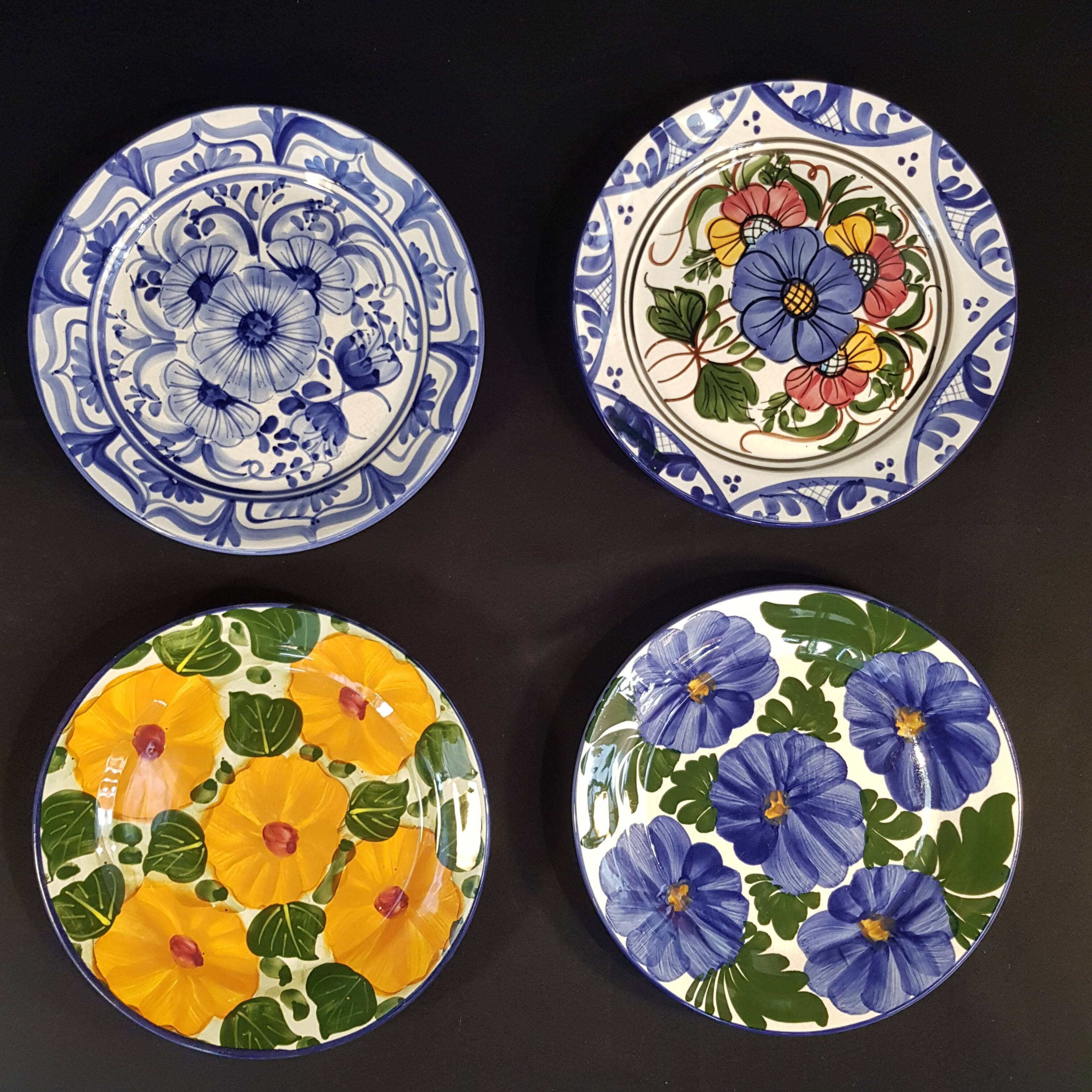 4 decorative earthenware plates