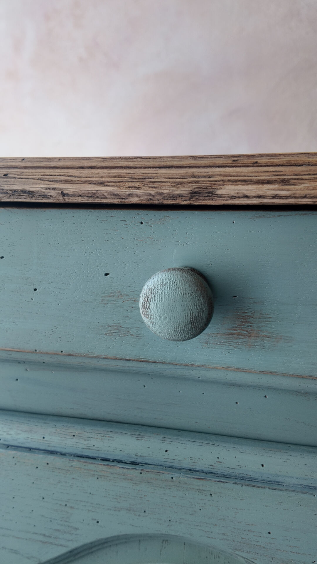 Small vintage side table in sage green patina and solid wood.