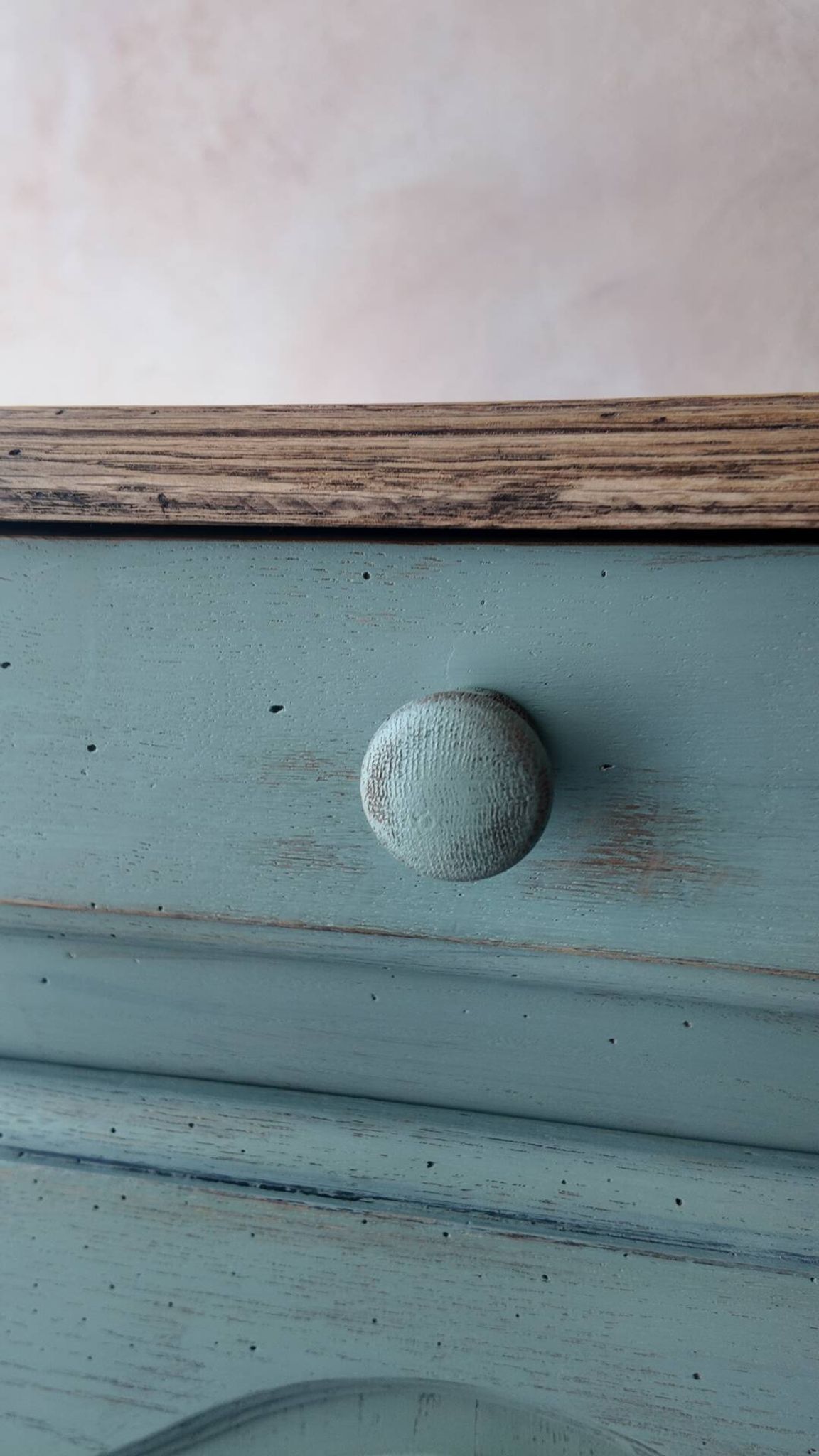 Small vintage side table in sage green patina and solid wood.