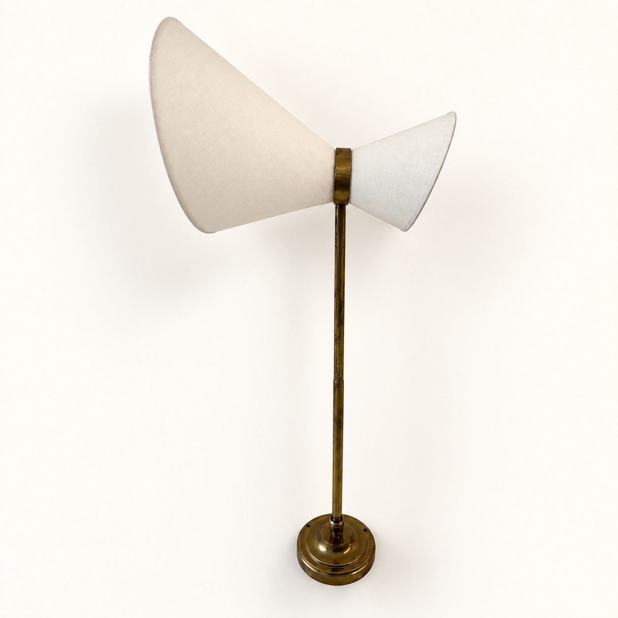 Extendable wall light in the style of Maison Lunel.