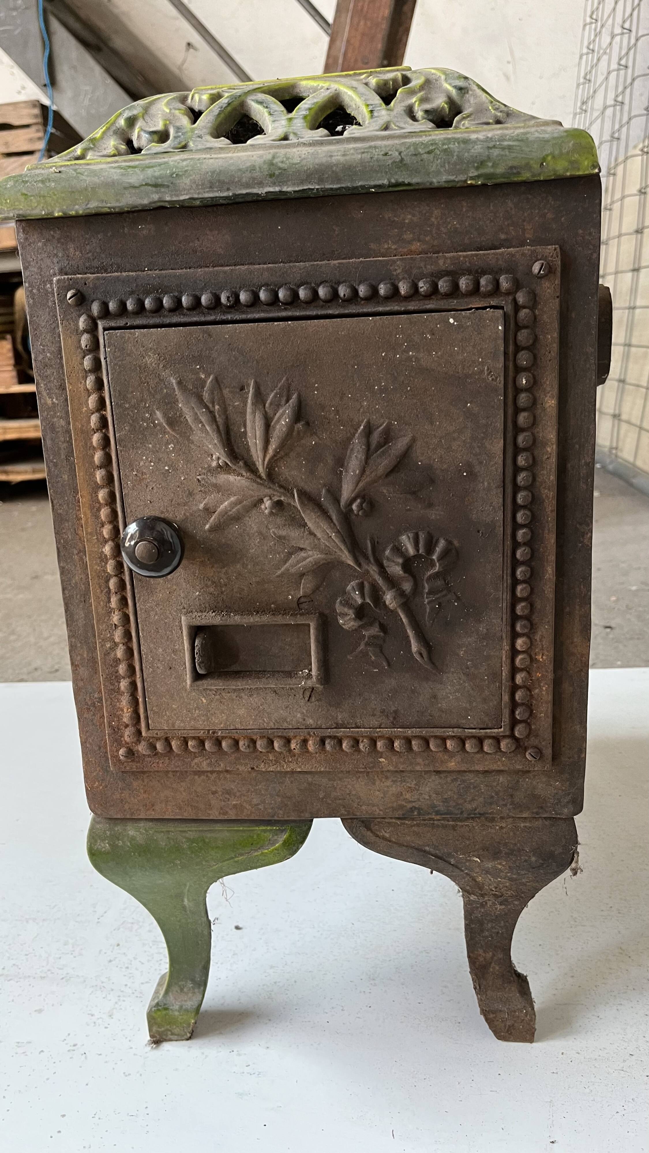 Mirus old enameled cast iron wood stove