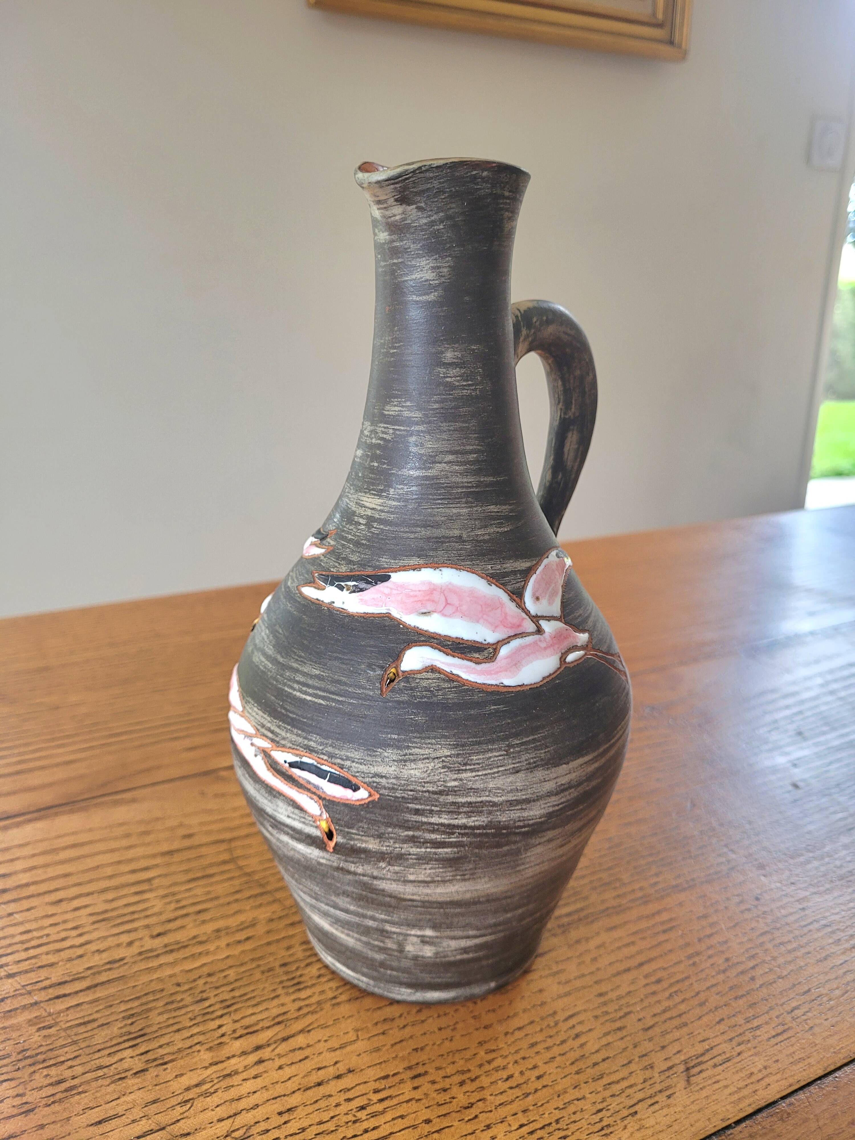 Rare signed ceramic and enameled porcelain pitcher